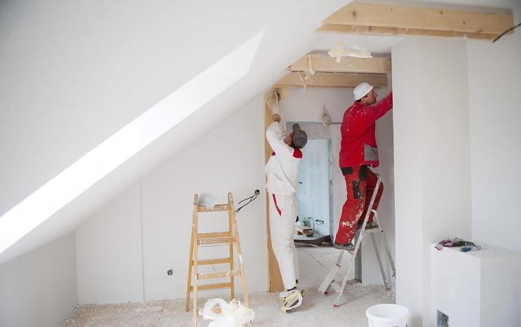 Tradesmen working on a room